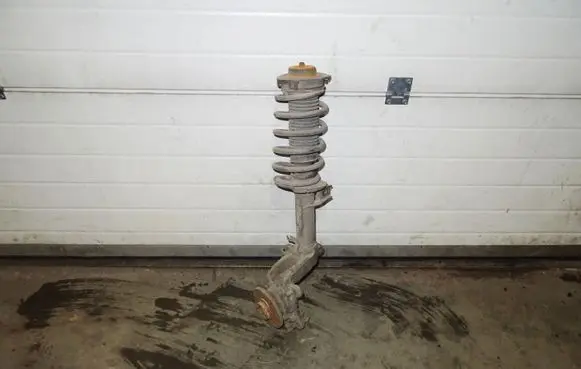 Volkswagen Caddy Front shock absorber with coil spring