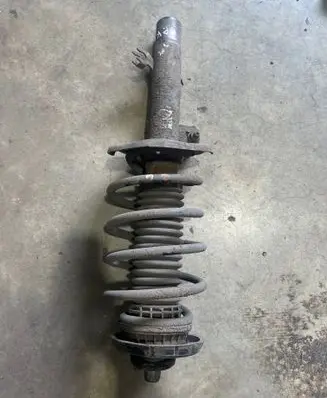 Peugeot 208 Front shock absorber with coil spring 7292