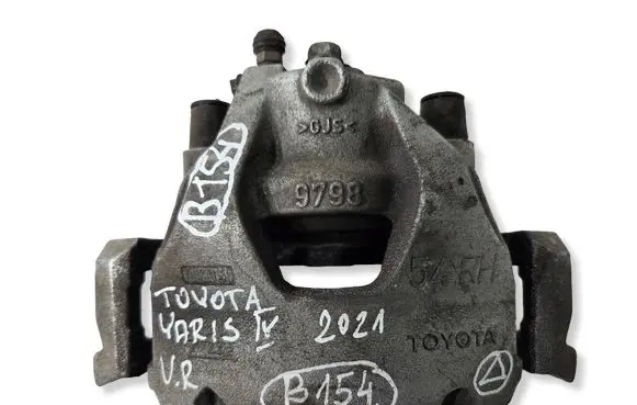 Toyota Yaris XP210 Front brake caliper 979854EH