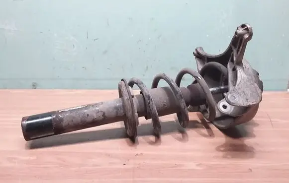 Front shock absorber with coil spring