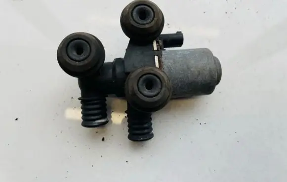 Coolant heater control valve