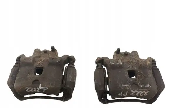 Nissan Juke I F15 Front brake caliper