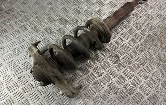 Front shock absorber with coil spring
