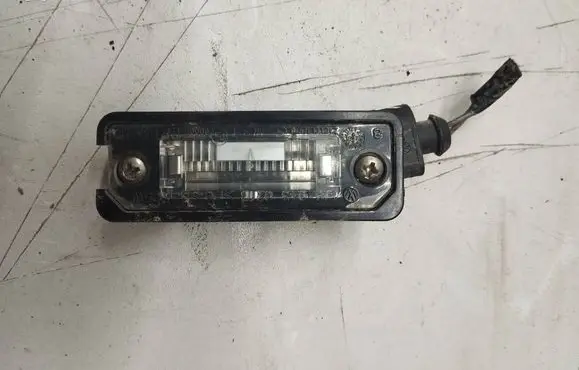 Volkswagen Golf V Number plate light 1J6943021B