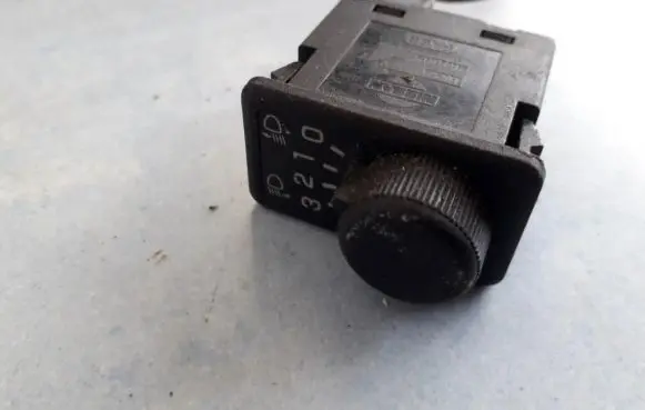 Headlight level height control switch