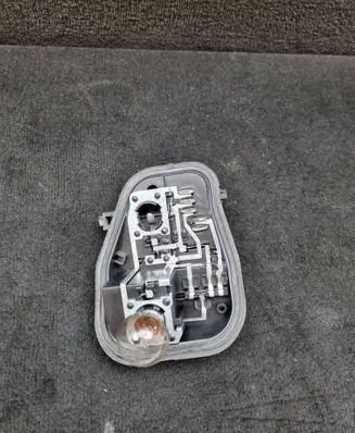 Tail light bulb cover holder