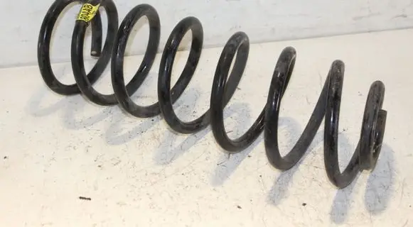 Dodge RAM 1500 DS Rear coil spring 68042804AA