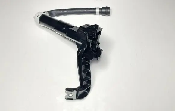 Headlight washer spray nozzle