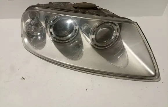 Volkswagen Touareg I Headlight/headlamp 7L6941016BK 89307861