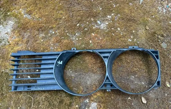 BMW 7 E32 Under headlight/headlamp trim 19384250