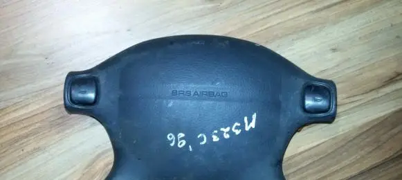 Mazda 323 Steering wheel airbag T93013A