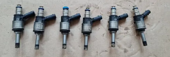 Audi A6 C7 Fuel injector 06E095A