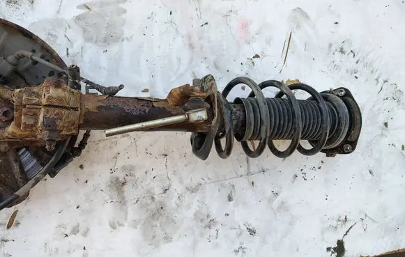 Volkswagen Golf VI Front shock absorber with coil spring