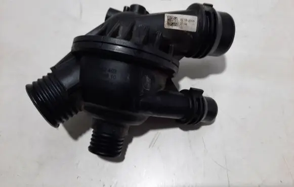 Thermostat/thermostat housing