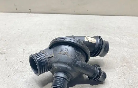 Thermostat/thermostat housing