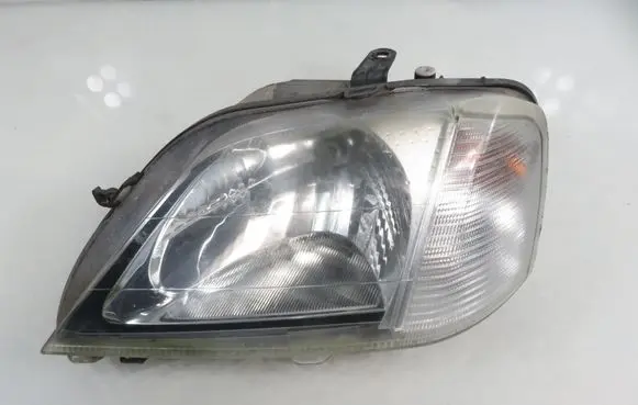 Dacia Logan I Headlight/headlamp 8200211005