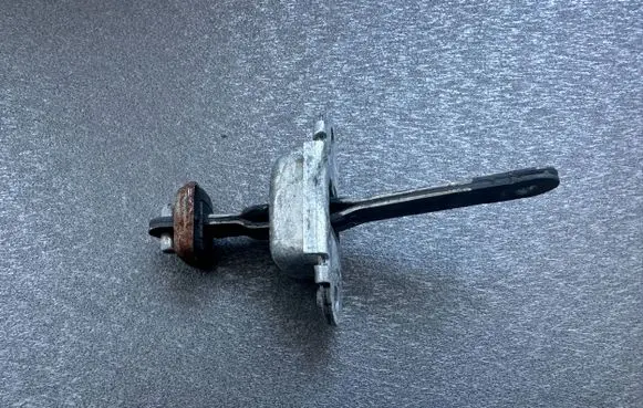 Nissan Terrano Rear door check strap stopper 8243099G00