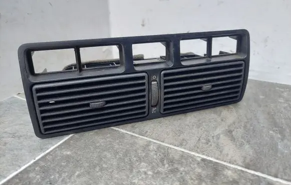 Volkswagen Golf IV Dash center air vent grill 1J0819734C
