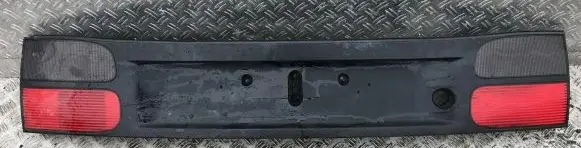 Renault Laguna I Trunk door license plate light bar 7700820049