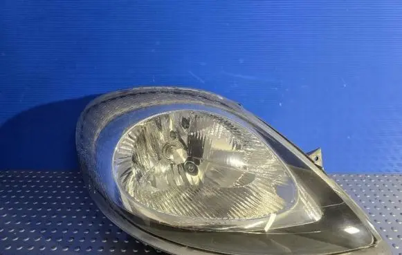 Opel Vivaro Headlight/headlamp 7700311372