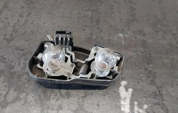 BMW 3 E46 Tail light bulb cover holder 230569L 230573L
