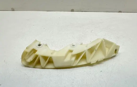 Infiniti G37 Front bumper mounting bracket 
