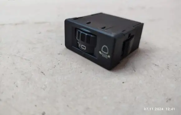 Headlight level height control switch