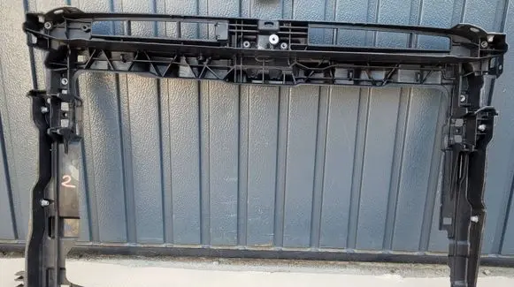 Engine bonnet/hood lock trim molding