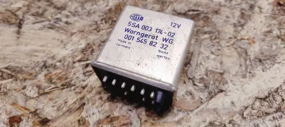 Mercedes-Benz 380 560SEC C126 Seat belt warning relay 0015458232