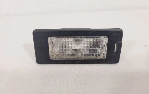 Volkswagen Golf VI Number plate light 1K9943127 1K9943021