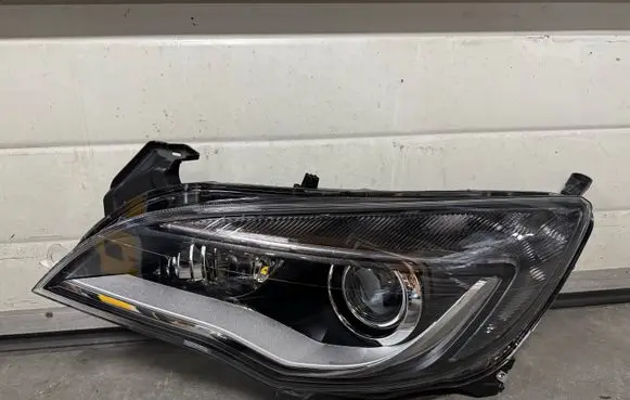 Opel Astra J Headlight/headlamp 1ZT01001235 13398144LH