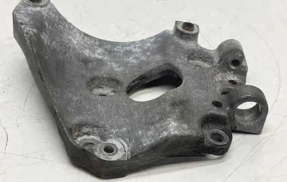 Volvo V40 A/C compressor mount bracket AV6Q10K360AA