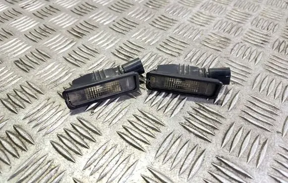 Volkswagen Golf VI Number plate light 1K8943021