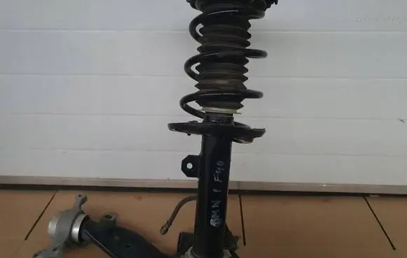 BMW 1 F40 Front shock absorber with coil spring 