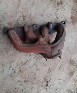 Volkswagen Golf III Exhaust manifold 030173551J