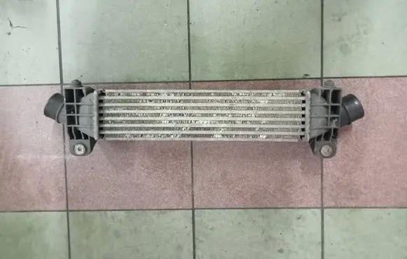 Ford Mondeo Mk III Intercooler radiator 1s7q9l440af