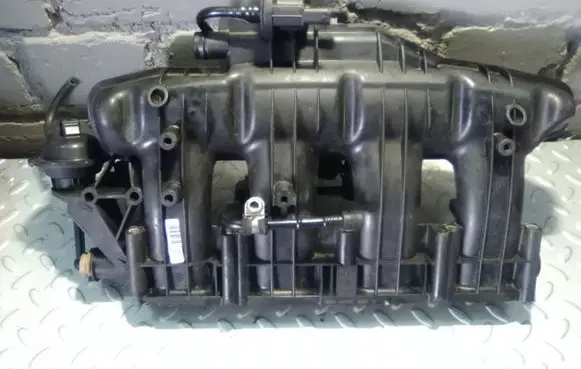 Volkswagen Jetta VI Intake manifold 06L133201AS 06L133201FB 06L133201AB