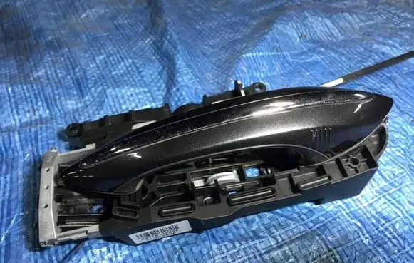Rear door exterior handle/bracket
