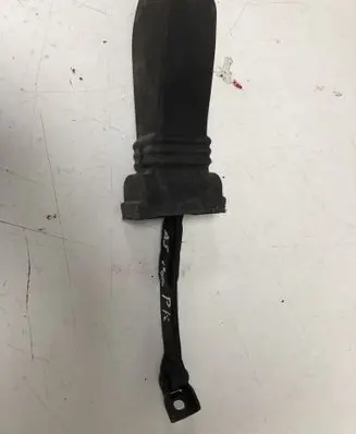 Front door check strap stopper