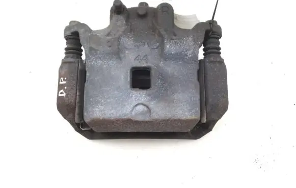 Nissan Juke I F15 Front brake caliper
