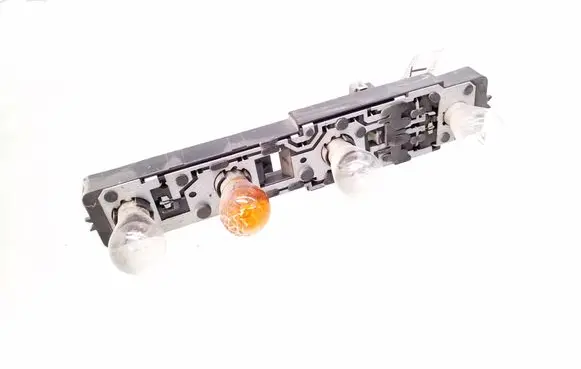 Tail light bulb cover holder