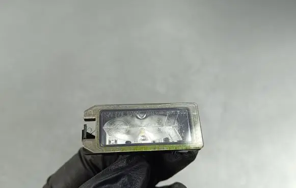 Jeep Grand Cherokee Number plate light 68228927AA