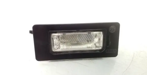 Volkswagen PASSAT B6 Number plate light 8T0943021