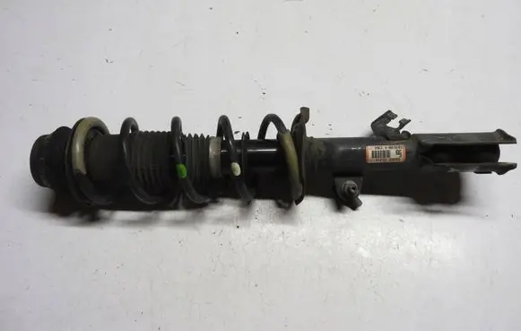 Nissan Note (E12) Front shock absorber with coil spring 543023VJ1A