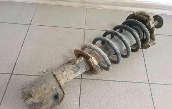 Opel Vivaro Front shock absorber with coil spring