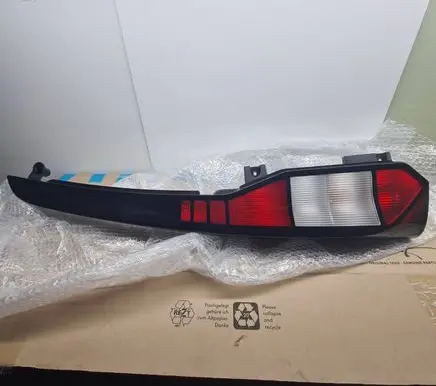 Volkswagen Caddy Tail light bulb cover holder 2K7945257 03805050