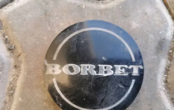 Volkswagen Touareg I Original wheel cap 74404