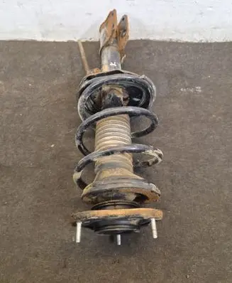 Toyota Avensis T250 Front shock absorber with coil spring 