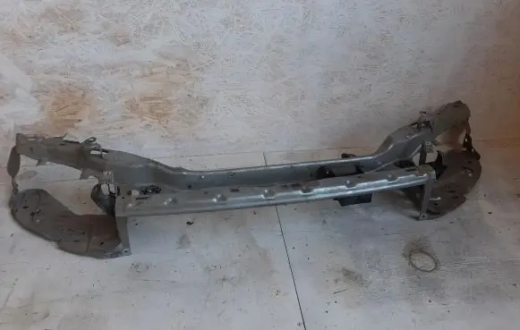 Top upper radiator support slam panel