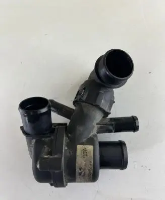 Thermostat/thermostat housing